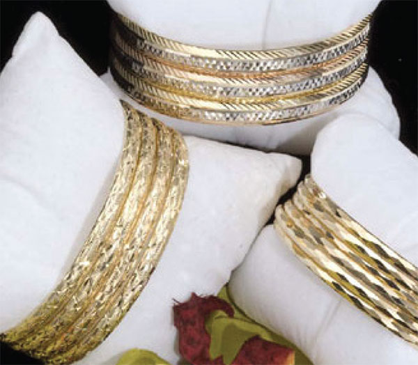 13. Choice of Gold Bangles by Kelly