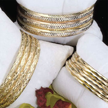 13. Choice of Gold Bangles by Kelly